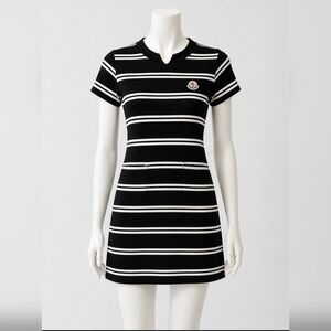 Dark blue and white striped knit mini dress with Moncler-style chest logo patch.